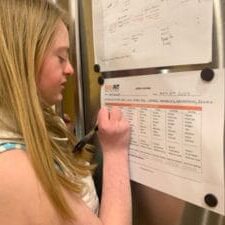 girl-filling-out-fitness-tracker