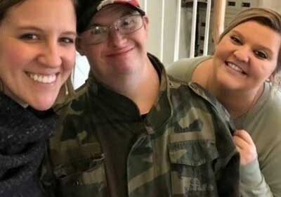 Holly Tonak( Director of Fort Wayne GiGi’s Playhouse), Matt (GiGi’s Participant), and Shelby volunteering at Shepherd’s House
